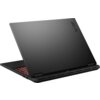 Czarny laptop z widocznym logo "TUF" na pokrywie, z częściowo otwartą klawiaturą podświetloną na czerwono. Widać również otwory wentylacyjne z tyłu urządzenia.