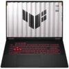 Na zdjęciu widoczny jest laptop z otwartym ekranem, na którym znajduje się logo w kształcie litery "V" oraz napisy "TUF" i "STAY TOUGH". Klawiatura laptopa jest podświetlona na czerwono.