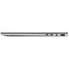 Srebrny laptop widziany z boku, z widocznymi portami: HDMI, dwa porty USB-C, gniazdo audio oraz otwory wentylacyjne. Obudowa jest smukła, a powierzchnia gładka.