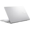 Srebrny laptop z widocznym logo "ASUS Vivobook" na pokrywie, z kilkoma portami po jednej stronie. Klawiatura jest częściowo widoczna, a ekran jest zamknięty.