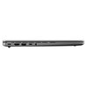 Na zdjęciu widoczny jest bok zamkniętego laptopa z kilkoma portami: USB-C, HDMI, USB-A, gniazdem audio oraz kolejnym portem USB-C. Laptop ma smukłą, srebrną obudowę.