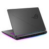 Czarny laptop z podświetlaną klawiaturą, widoczny od tyłu z logo producenta na pokrywie. Dolna krawędź obudowy emituje kolorowe światło.