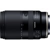 Na zdjęciu widoczny jest czarny obiektyw z oznaczeniami: "18-300mm F/3.5-6.3 Di III-A VC VXD" oraz "TAMRON". Obiektyw posiada pierścienie z oznaczeniami ogniskowej, przełączniki AF/MF i VC ON/OFF oraz przycisk LOCK.