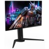 Monitor z wyświetlaczem przedstawiającym futurystycznego robota na tle neonowego miasta, z widocznym tekstem "TEAM UP FIGHT ON" oraz logo "AORUS". Monitor ma nowoczesną podstawę i smukłe ramki.