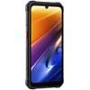 Smartfon z pomarańczowym akcentem na obudowie, wyświetlający dynamiczną grafikę w odcieniach pomarańczowego, fioletowego i niebieskiego. Na bocznej krawędzi widoczne są przyciski oraz napis "SHOCKPROOF".