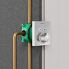Zielony korpus Boxa HANSGROHE iBox 01800180 jest zamontowany na ścianie, z widocznymi miedzianymi rurami. Na srebrnym panelu znajduje się logo "hansgrohe" oraz pokrętło z oznaczeniem temperatury "40°".