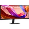 Monitor LG UltraWide z kolorowym, abstrakcyjnym tłem na ekranie, z widocznym napisem "LG UltraWide Monitor". Monitor ma cienkie ramki i stoi na prostokątnej podstawie.