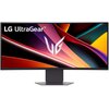 Na zdjęciu widoczny jest monitor z logo "LG UltraGear" w lewym górnym rogu ekranu, na którym wyświetlany jest kolorowy, abstrakcyjny wzór z dominującymi odcieniami czerwieni, pomarańczu i fioletu. Na środku ekranu znajduje się duże, stylizowane logo "V" w