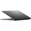Na zdjęciu widoczny jest częściowo otwarty laptop w kolorze ciemnoszarym, z widocznym logo "ASUS VivoBook" na pokrywie. Laptop ma smukłą konstrukcję, a na boku obudowy znajdują się porty.
