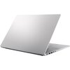 Na zdjęciu widoczny jest srebrny laptop z otwartą pokrywą, na której znajduje się subtelne logo producenta. Laptop ma smukłą konstrukcję, a na boku obudowy widać kilka portów.