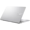 Srebrny laptop z widocznym logo "ASUS Vivobook" na obudowie. Laptop jest zamknięty, a jego powierzchnia jest gładka i minimalistyczna.