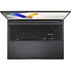 Na zdjęciu widoczny jest otwarty laptop z klawiaturą QWERTY i dużym touchpadem, a na ekranie wyświetla się napis "ASUS Vivobook". Klawiatura zawiera klawisze numeryczne, a obudowa jest w ciemnym kolorze.
