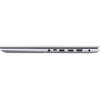 Srebrny laptop widziany z boku, z widocznymi portami: gniazdo audio, USB-C, dwa porty USB, HDMI oraz gniazdo zasilania. Obudowa jest smukła, a powierzchnia gładka.