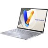 Srebrny laptop z otwartym ekranem, na którym widoczna jest abstrakcyjna grafika oraz napis "ASUS Vivobook". Klawiatura jest pełnowymiarowa, a obudowa ma kilka portów po boku.