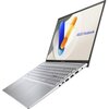 Srebrny laptop z otwartym ekranem, na którym widnieje kolorowa grafika oraz napis "ASUS Vivobook". Klawiatura jest pełnowymiarowa, a na boku obudowy znajdują się różne porty.