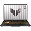 Laptop z otwartym ekranem, na którym widoczny jest duży, ciemny symbol na tle przypominającym metalowe panele. Klawiatura jest podświetlona na żółto, a na ekranie widnieje tekst: "TUF STAY TOUGH".
