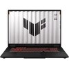 Laptop z podświetlaną klawiaturą i ekranem wyświetlającym logo w kształcie litery "V" na tle przypominającym metalowe panele. Na ekranie widoczny jest tekst: "TUF STAY TOUGH".
