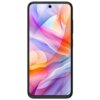 Smartfon z dużym wyświetlaczem o przekątnej 6.7 cala, prezentujący kolorową, abstrakcyjną grafikę z dominującymi odcieniami różu, pomarańczu i fioletu. Na górze ekranu widoczna jest centralnie umieszczona kamera przednia.