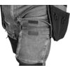 Szare spodnie robocze z materiału denim z widocznymi kieszeniami zapinanymi na rzepy oraz czarnymi dodatkami, w tym uchwytami na narzędzia. Produkt to "Spodnie robocze NEO TOOLS Denim 81-361-2-L (rozmiar L/52)".