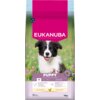 Opakowanie karmy dla psa EUKANUBA Puppy Medium Breed Kurczak 15 kg przedstawia zdjęcie szczeniaka na tle zielonej łąki z różowymi kwiatami. Na opakowaniu widnieje napis: "EUKANUBA SUPPORTS A LONG AND HEALTHY LIFE" oraz "PUPPY 1-12 MONTHS 10-25 KG", a takż