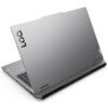 Srebrny laptop z widocznym logo "LOQ" na pokrywie, z otwartym ekranem i klawiaturą z podświetleniem. Na obudowie znajduje się również logo "Lenovo".