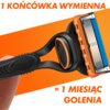 Na zdjęciu znajduje się golarka z pomarańczowo-niebieską głowicą i czarną rączką, na tle pomarańczowego gradientu. Widoczny jest tekst: "1 KOŃCÓWKA WYMIENNA = 1 MIESIĄC GOLENIA".