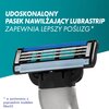 Na zdjęciu widoczna jest maszynka do golenia z niebieskim paskiem nawilżającym oraz tekst: "UDOSKONALONY PASEK NAWILŻAJĄCY LUBRASTRIP ZAPEWNIA LEPSZY POŚLIZG*". W lewym dolnym rogu znajduje się dopisek: "* w porównaniu z poprzednim modelem Mach3".