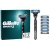 Opakowanie produktu z napisem "Gillette Mach3" oraz grafiką golarki i siedmiu ostrzy. Obok znajduje się golarka z widocznym logo "Gillette" na rączce oraz siedem wymiennych ostrzy ułożonych w pionie.