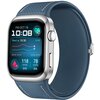 Na zdjęciu znajduje się smartwatch z niebieskim paskiem i srebrną kopertą, na którego ekranie widoczny jest interfejs z datą "FRI OCT 18", godziną "10:08", wykresem oraz wartościami ciśnienia krwi "118 SYS" i "78 DIA". Obok wykresu znajduje się napis "Nex