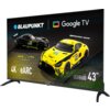 Telewizor z logo BLAUPUNKT i Google TV wyświetla obraz dwóch wyścigowych samochodów z napisami "IRON LYNX", "4K", "eARC" oraz "UGB5500 Series 43"".