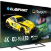 Na zdjęciu widoczny jest telewizor z wyświetlonym obrazem samochodu wyścigowego oraz tekstem: "BLAUPUNKT", "Google TV", "4K", "QD-MiniLED", "Dolby Vision IQ", "Series MBG7000", "65”". Obok samochodu znajduje się napis "IRON LYNX MOTORSPORT LAB".