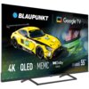 Telewizor z wyświetlonym obrazem samochodu wyścigowego w żółto-czarnych barwach, z logo "BLAUPUNKT" i "Google TV" oraz napisami "4K", "QLED", "MEMC", "Dolby Atmos", "QBG6000S Series 55"".
