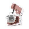 Robot kuchenny planetarny w kolorze różowo-białym z metalową misą i trzepaczką, na obudowie widoczne napisy: "Gratussimo", "1200 W", "ETA Gratussino III Elements".