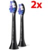 Na zdjęciu znajdują się dwie czarne końcówki do szczoteczki z kolorowymi włóknami, z widocznym napisem "PHILIPS Sonicare S2". W prawym górnym rogu widnieje czerwony napis "2x".