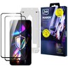 Na zdjęciu znajduje się opakowanie szkła hartowanego 3MK Hardy Hardura 9H do Samsung Galaxy A56, zawierające dwie sztuki, z widocznym napisem "2 pcs included" oraz logo "3mk". Obok opakowania widoczne są dwa arkusze szkła hartowanego oraz telefon z koloro