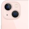 Zbliżenie na różowy smartfon z dwoma obiektywami aparatu i lampą błyskową umieszczonymi w kwadratowym module. Obok obiektywów widoczny jest mały otwór mikrofonu.