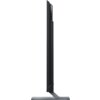 Na zdjęciu widoczny jest telewizor o bardzo smukłym profilu, ustawiony na metalowej podstawie. Na obudowie znajduje się napis "XIAOMI" oraz "MINILED".