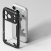 Czarno-przezroczyste etui na telefon z widocznymi wycięciami na aparat i przyciski, umieszczone obok srebrnego smartfona. Etui ma wzmocnione narożniki i przezroczysty tył.