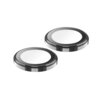 Dwa okrągłe elementy przypominające pierścienie, wykonane z przezroczystego materiału, z metalicznym obramowaniem. Produkt to szkło hartowane na obiektyw CELLULARLINE Camera Lens Ring do Apple iPhone 17.