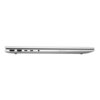 Przedstawiony jest bok srebrnego laptopa z widocznymi portami: HDMI, dwa porty USB, port USB-C, gniazdo audio oraz logo "poly studio". Laptop jest zamknięty, a jego obudowa ma gładkie wykończenie.
