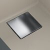 Na zdjęciu widoczny jest zlewozmywak jednokomorowy w kolorze orzechowym z metaliczną pokrywą. Na pokrywie znajduje się logo "FRANKE".
