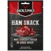 Opakowanie przekąski mięsnej z napisem "JACK LINK'S MEAT SNACKS" oraz "HAM SNACK" na tle drewnianej deski z kawałkami suszonej wieprzowiny. Dodatkowe informacje to "MORE THAN 50% PROTEIN", "NO ADDED SUGAR", "MADE OF 100% LEAN PORK", "SEASONED, MARINATED &