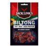 Opakowanie suszonej wołowiny marki Jack Link's z napisem "BILTONG" oraz informacjami "100% BEEF | HIGH PROTEIN" i "NO ADDED SUGAR". Na dole widoczne są kawałki suszonego mięsa na ciemnym tle.