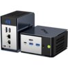 Na zdjęciu widoczne są dwa czarne, kompaktowe komputery z logo "GMKtec", z różnymi portami, w tym USB, HDMI, LAN i przyciskiem zasilania. Obudowy mają kratki wentylacyjne, a na jednym z urządzeń widoczny jest zielony przycisk zasilania.