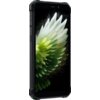 Smartfon z wyświetlaczem przedstawiającym zielono-białe liście na czarnym tle. Na boku urządzenia widoczny jest napis "SIM/TF".