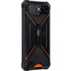 Czarny smartfon z pomarańczowymi akcentami, posiadający wytrzymałą obudowę z widocznym logo "OUKITEL" oraz oznaczeniami CE. Na górnej części znajdują się trzy obiektywy aparatu i napis "HD".