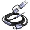 Na zdjęciu znajduje się pleciony kabel z trzema różnymi złączami: USB, USB-C i mini jack, z widocznym logo "UGREEN" na dwóch z nich. Kabel ma metaliczne wykończenie w odcieniach szarości i czerni.
