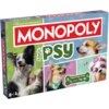 Pudełko gry planszowej Monopoly Psy z kolorowymi zdjęciami psów na okładce, z dużym napisem "MONOPOLY" w czerwonym prostokącie oraz "PSY" w zielonym. Widoczny jest tekst "Od zera do milionera", "Edycja", "Dedykowane pionki" oraz oznaczenie wiekowe "8+".