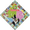 Plansza do gry Monopoly z motywem psów, z centralnym logo "MONOPOLY" na kolorowym tle i różnymi zdjęciami psów na polach wokół planszy. Na planszy widoczne są napisy takie jak "START", "PARKING", "WIĘZIENIE" oraz "IDŹ DO WIĘZIENIA".