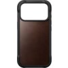 Brązowe etui z gładkiej skóry z czarną ramką, przeznaczone do telefonu, z dużym otworem na aparat w górnej części. Produkt ma minimalistyczny design bez widocznych napisów ani logo.